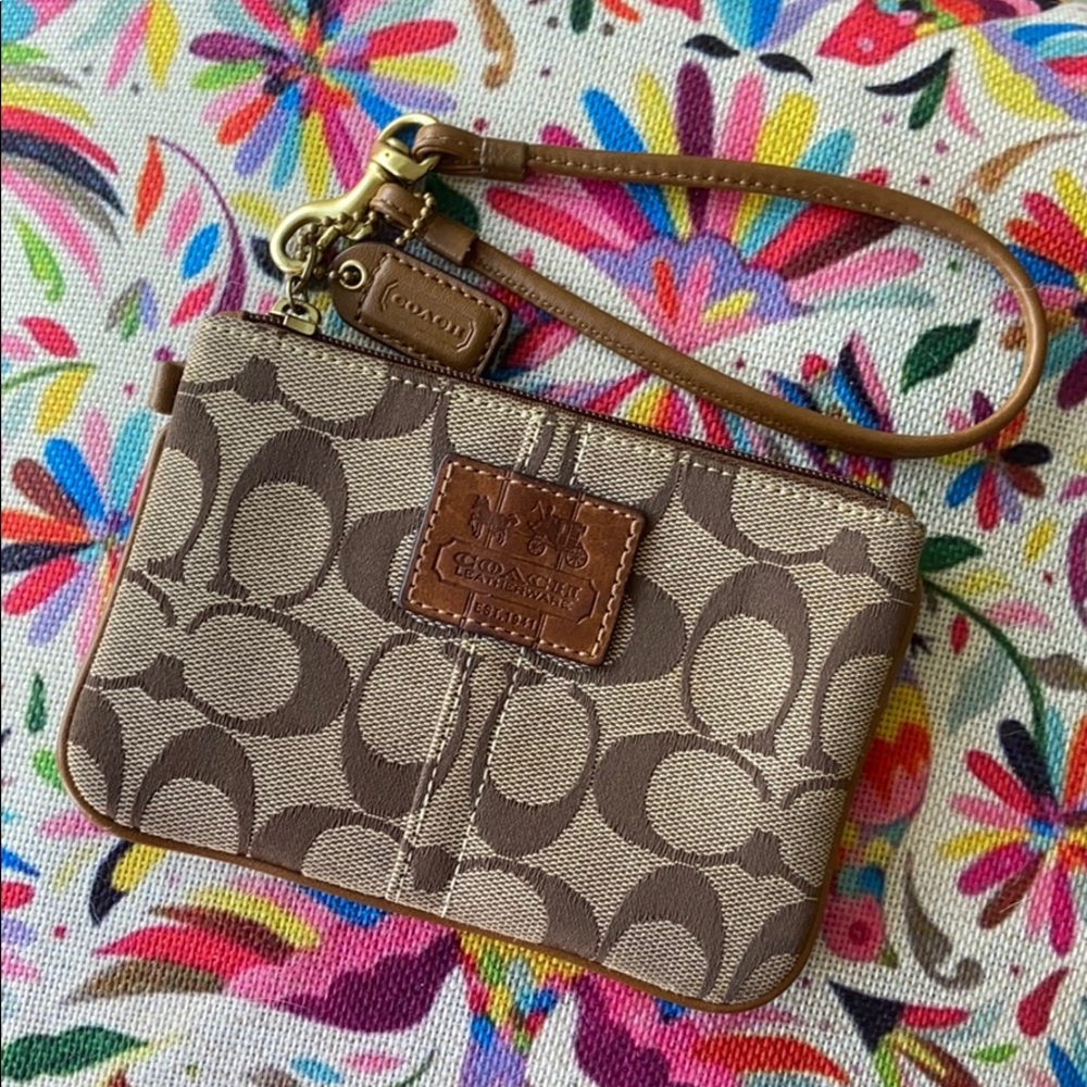 COACH Corner zip wristlet signature canvas logo
